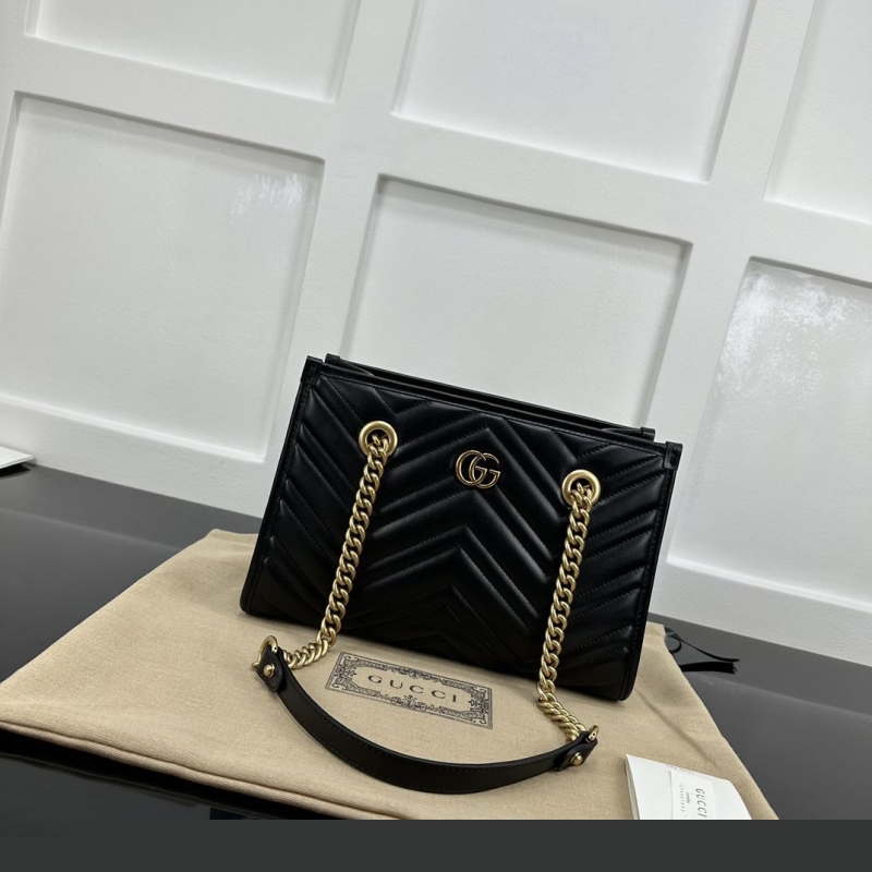 G*u*i top handle bags